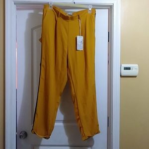 Mustard pants with black stripe